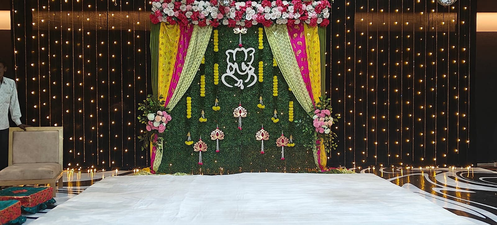A festive stage backdrop set up for a Prachiti Caterers function